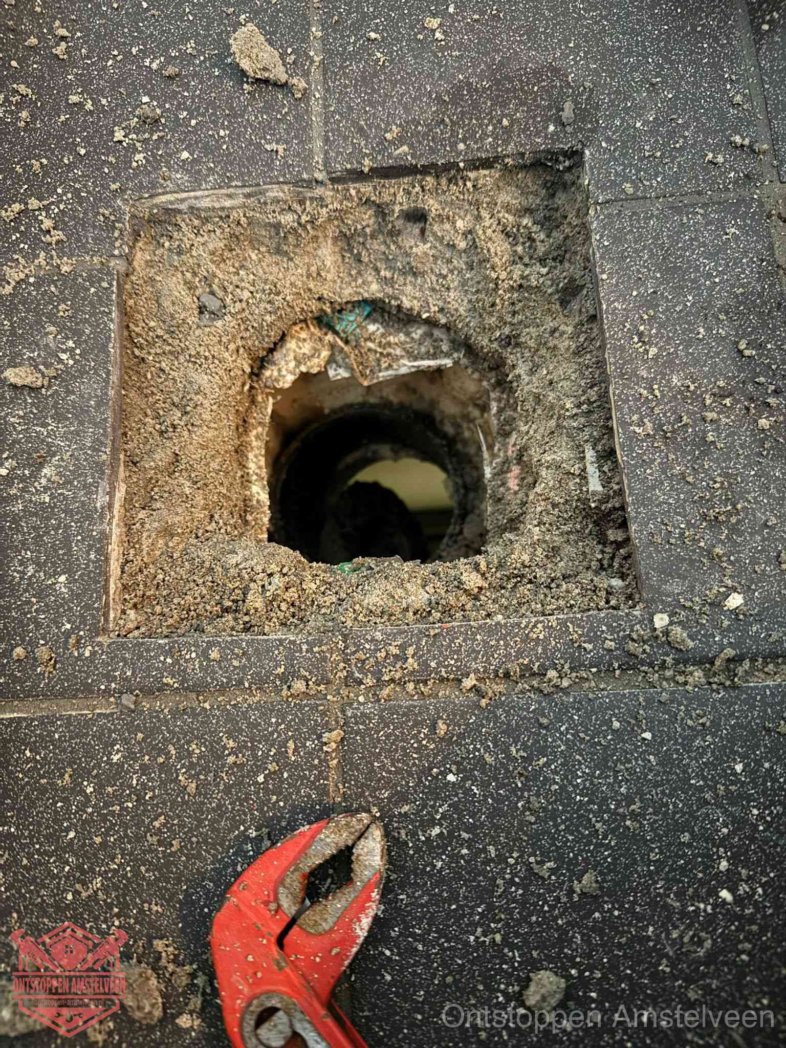 Rioolputje erfgrens eigendom in Amstelveen